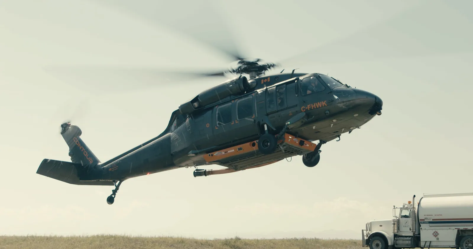 A Contour Helicopters Black Hawk in flight with VoxVision mounted beneath the nose.